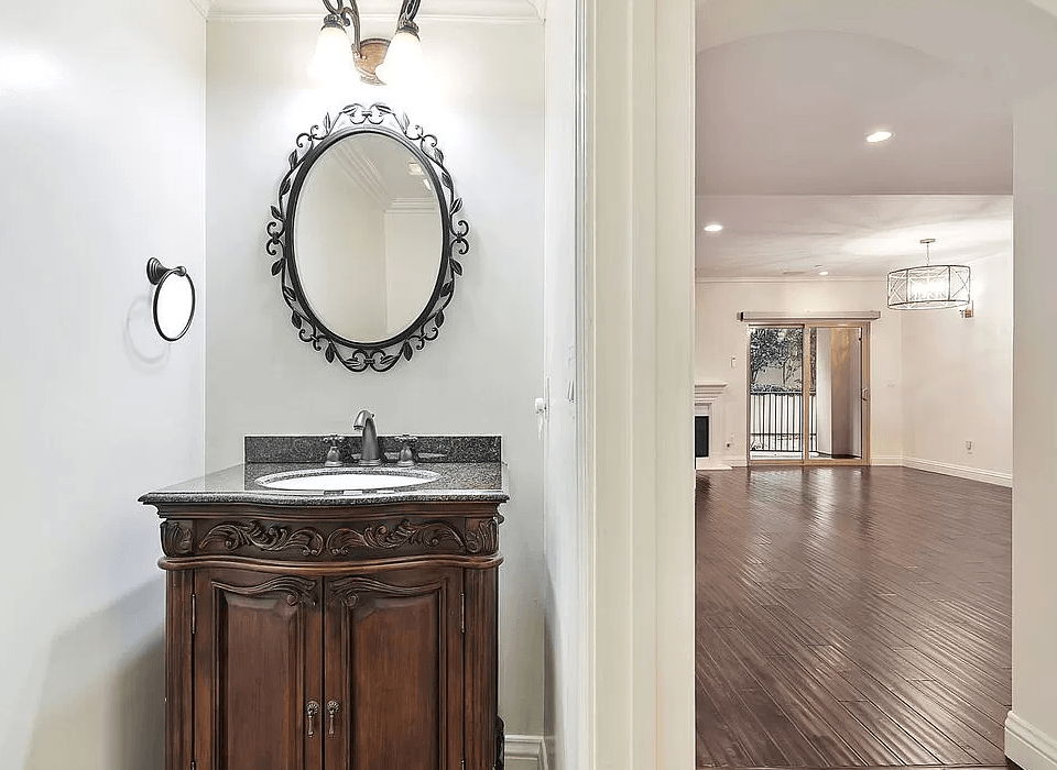 a bathroom with a sink and a mirror